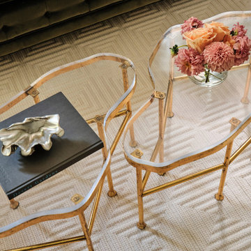 Custom tables and flooring in a European-inspired sitting area
