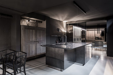 This is an example of an expansive contemporary open plan kitchen in Berlin with open cabinets, stainless steel cabinets, marble worktops and an island.