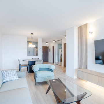 Open-Concept Condo Living Room with Custom TV Millwork – North Vancouver Renovat