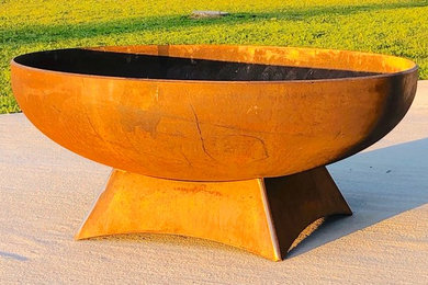 Inspiration for a large mediterranean drought-tolerant and full sun backyard landscaping in Dallas with a fire pit for fall.
