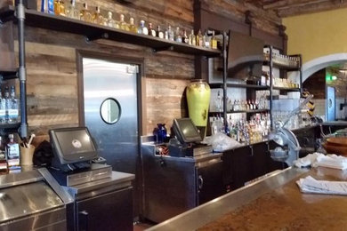 Iron Pipe Shelving In Restaurant Bar Area