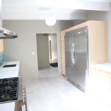 Kitchen to Entry and Living Room After