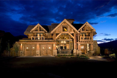 Mountain style three-story wood gable roof photo in Denver
