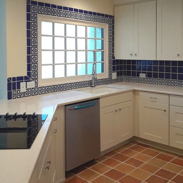 Talavera Tile Backsplash With Saltillo Tile Flooring