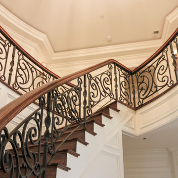 Project #74 | Circular Staircase with Hand-Forged Metal Panels