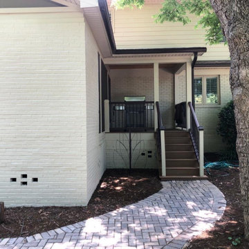 Screen porch, basketball court, and landscaping