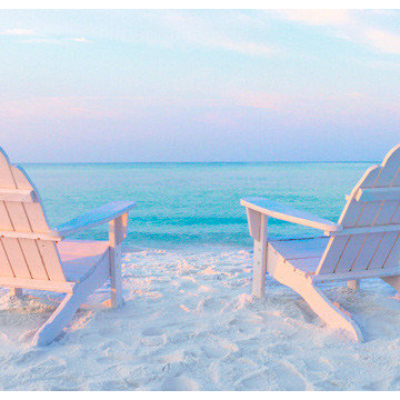 Adirondack chairs on beach