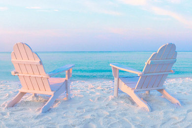 Adirondack chairs on beach