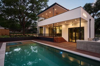 Example of a large minimalist patio design in Austin