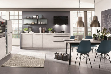 Large eat-in kitchen in Other with grey cabinets, with island and grey benchtop.