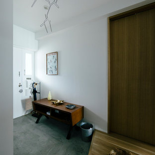 他の地域の片開きドア北欧スタイルのおしゃれな玄関 (黒いドア) の写真