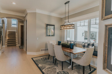 Example of an arts and crafts dining room design in Grand Rapids