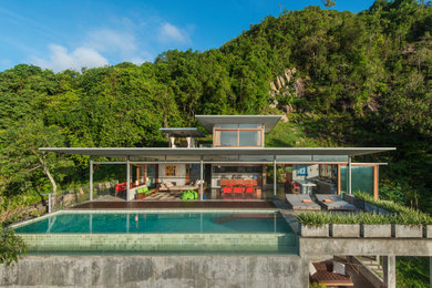 Inspiration for an asian exterior home remodel in Denver