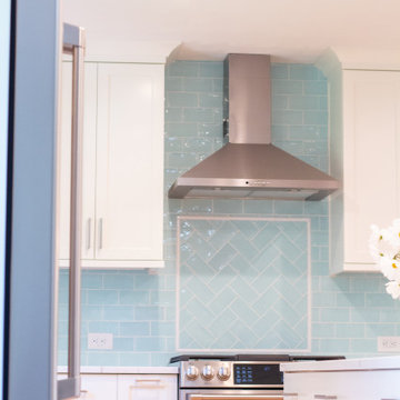 White Kitchen with Aquamarine Tile