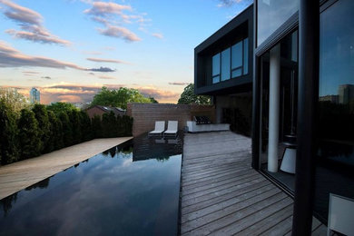 Example of a trendy home design design in Other
