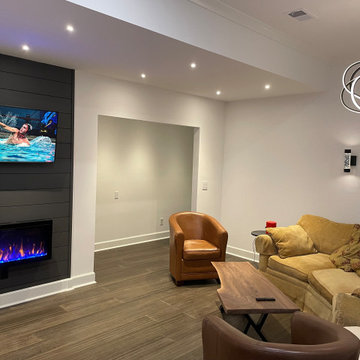 Basement launch and bar buildout with custom furniture