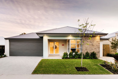 Inspiration for a contemporary one-storey brick white exterior in Perth.