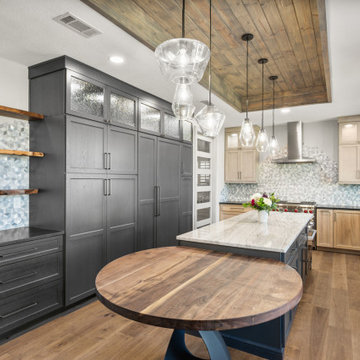 Modern Kitchen Island with White Marble Waterfall and Round Walnut Extension Tab