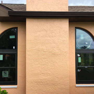 DuraShield V Impact Windows and Sliding Glass Doors in Bronze color