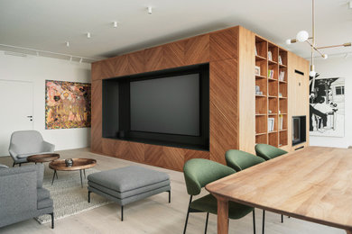 Inspiration for a contemporary light wood floor living room library remodel with a ribbon fireplace and a wood fireplace surround