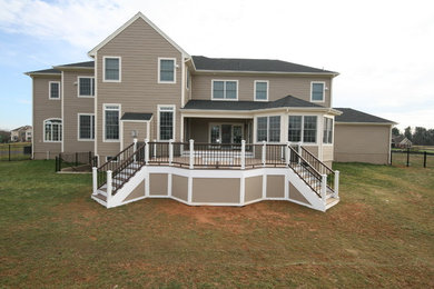 Inspiration for a mid-sized timeless backyard deck remodel in Baltimore with no cover
