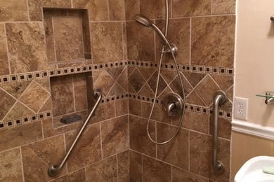 Example of a mid-sized transitional 3/4 bathroom design in Other with beige walls and a pedestal sink