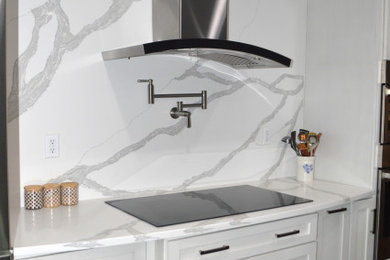 Kitchen - huge contemporary kitchen idea in Richmond with quartz countertops, white backsplash, stone slab backsplash and white countertops