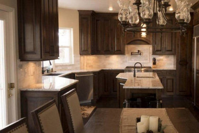 Example of a mid-sized classic u-shaped eat-in kitchen design in Other with an undermount sink, dark wood cabinets, white backsplash and an island