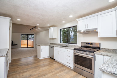 Example of a classic kitchen design in Other