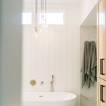 Warm Modern Primary Bathroom Remodel in Olathe