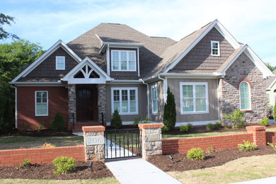 Craftsman two-story mixed siding exterior home idea in Other