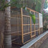 sleek beach garden chicken coop with run - beach style