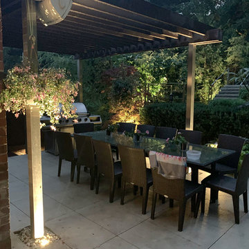 Infinity pool, patio, and landscape lighting in Toronto