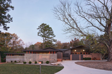 Example of a 1960s exterior home design in Charlotte