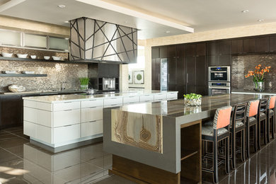 Example of a huge minimalist galley ceramic tile open concept kitchen design in New York with a drop-in sink, open cabinets, white cabinets, granite countertops, multicolored backsplash, mosaic tile backsplash, stainless steel appliances and two islands