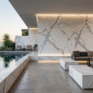 Modern Rooftop Pool with Calacatta OMG Porcelain Slab