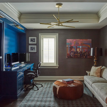Home Office with Tray Ceiling and Blue Built-in Cabinets