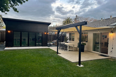 Inspiration for a small modern detached shed remodel in Other
