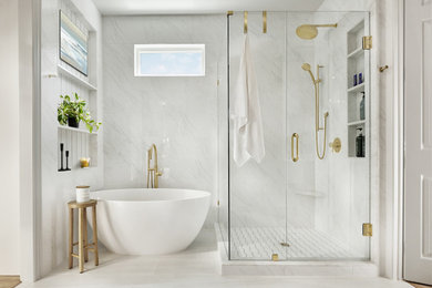 Large trendy master white tile white floor and double-sink bathroom photo in Dallas with white walls, a hinged shower door, white countertops, a niche and a built-in vanity