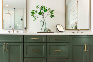 Inspiration for a medium sized contemporary ensuite bathroom in Atlanta with shaker cabinets, green cabinets, a freestanding bath, a two-piece toilet, porcelain tiles, porcelain flooring, a submerged sink, engineered stone worktops, a hinged door, a wall niche, double sinks and a built in vanity unit.