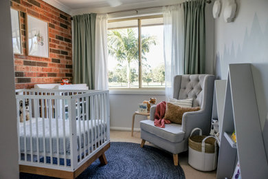 This is an example of a small scandinavian nursery for boys in Sydney.