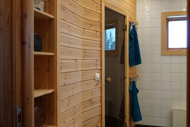 Inspiration för ett mellanstort nordiskt badrum