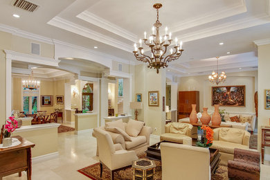 This is an example of a tropical family room in Miami.