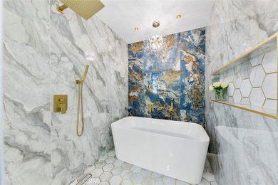 Mid-sized minimalist master blue tile and porcelain tile mosaic tile floor, white floor, double-sink and wall paneling bathroom photo in Orange County with shaker cabinets, white cabinets, a two-piece toilet, white walls, an undermount sink, quartz countertops, white countertops and a built-in vanity