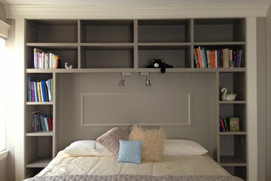 Inspiration for a mid-sized transitional guest bedroom remodel in Atlanta with gray walls and no fireplace