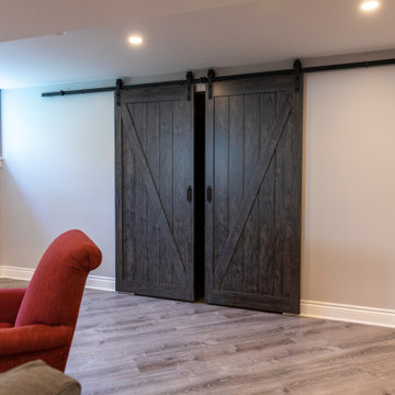 Basement with bedroom, hobby (train) room and gym