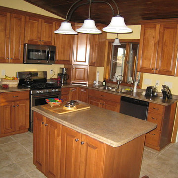 Maple Kitchen before stained glass window