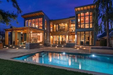 Huge elegant two-story mixed siding flat roof photo in San Francisco