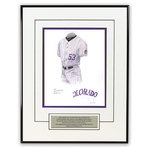 Heritage Sports Art - Original Art of the MLB 2001 Colorado Rockies Uniform - This beautifully framed piece features an original piece of watercolor artwork glass-framed in a timeless thin black metal frame with a double mat. The outer dimensions of the framed piece are approximately 13.5" wide x 17.5" high, although the exact size will vary according to the size of the original piece of art. At the core of the framed piece is the actual piece of original artwork as painted by the artist on textured 100% rag, water-marked watercolor paper. In many cases the original artwork has handwritten notes in pencil from the artist. Simply put, this is beautiful, one-of-a-kind artwork. The outer mat is a clean white, textured acid-free mat with an inset decorative black v-groove, while the inner mat is a complimentary colored acid-free mat reflecting one of the team's primary colors. The image of this framed piece shows the mat color that we use (Purple). Beneath the artwork is a silver plate with black text describing the original artwork. The text for this piece will read: This original, one-of-a-kind watercolor painting of the 2001 Colorado Rockies uniform is the original artwork that was used in the creation of thousands of Colorado Rockies products that have been sold across North America. This original piece of art was painted by artist Nola McConnan for Maple Leaf Productions Ltd. The piece is framed with an extremely high quality framing glass. We have used this glass style for many years with excellent results. We package every piece very carefully in a double layer of bubble wrap and a rigid double-wall cardboard package to avoid breakage at any point during the shipping process, but if damage does occur, we will gladly repair, replace or refund. Please note that all of our products come with a 90 day 100% satisfaction guarantee. If you have any questions, at any time, about the actual artwork or about any of the artist's handwritten notes on the artwork, I would love to tell you about them. After placing your order, please click the "Contact Seller" button to message me and I will tell you everything I can about your original piece of art. The artists and I spent well over ten years of our lives creating these pieces of original artwork, and in many cases there are stories I can tell you about your actual piece of artwork that might add an extra element of interest in your one-of-a-kind purchase. Please note that all reproduction rights for this original work are retained in perpetuity by Major League Baseball unless specifically stated otherwise in writing by MLB. For further information, please contact Heritage Sports Art at questions@heritagesportsart.com .