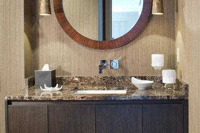 Inspiration for a mid-sized contemporary multicolored tile and mosaic tile marble floor powder room remodel in Other with flat-panel cabinets, dark wood cabinets, a one-piece toilet, brown walls, an undermount sink and marble countertops